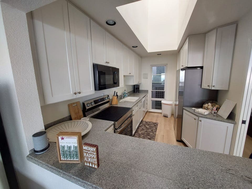 Spacious kitchen with ample prep space.