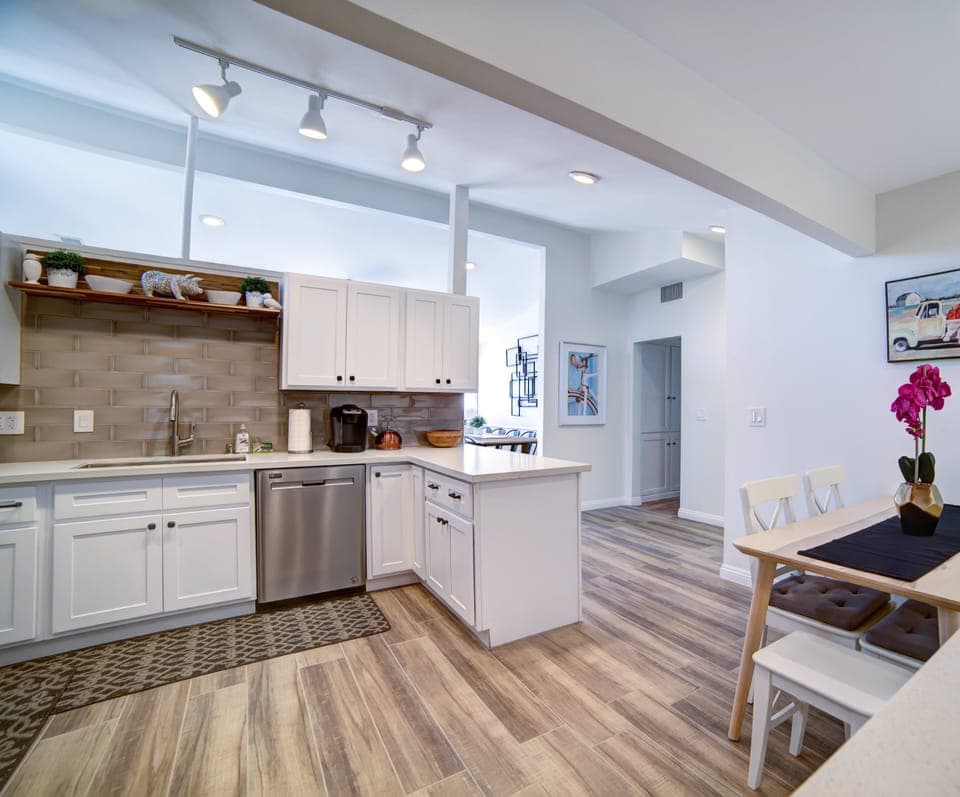 Kitchen is stocked with appliances and utensils