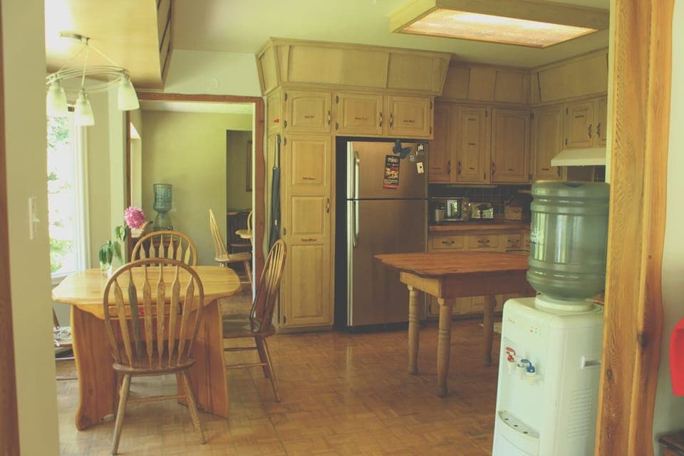 Full kitchen with breakfast nook overlooking the river.