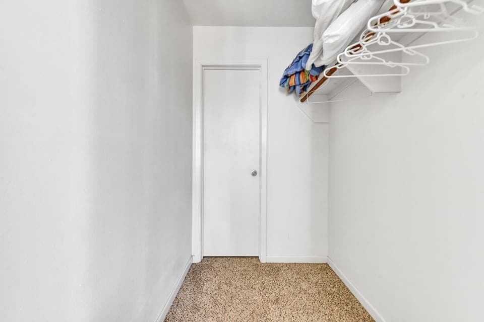 master bedroom closet (the back door of the closet is locked for owner's storage