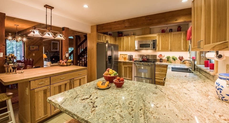 Kitchen opens to DR and Great Room with bar stools for group meal prep & convo
