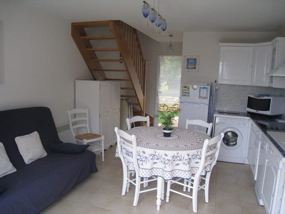 The living room and the kitchen