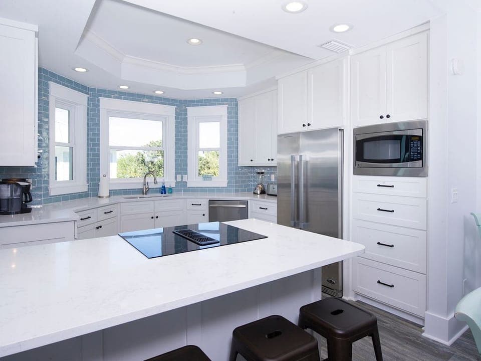 Well stocked with Dishes, Cooking Utensils, large & small Appliances