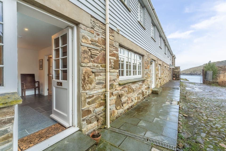 No. 2 The Fish Cellars, Port Isaac. Just footsteps from the shore, No. 2 The Fish Cellars is a stunning and unique two storey conversion