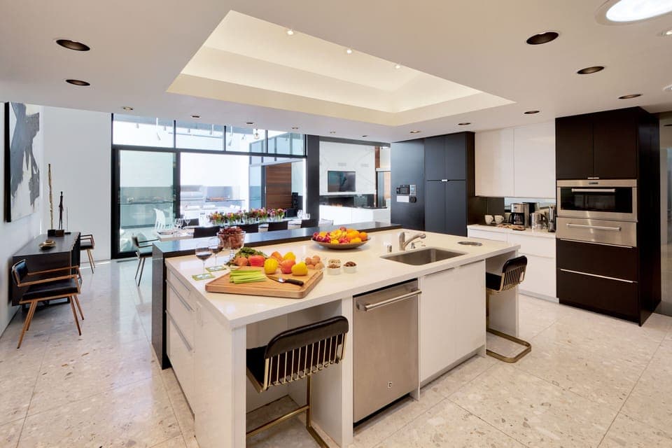 View from kitchen to dining. Huge island with seating, Wolf/SubZero appliances