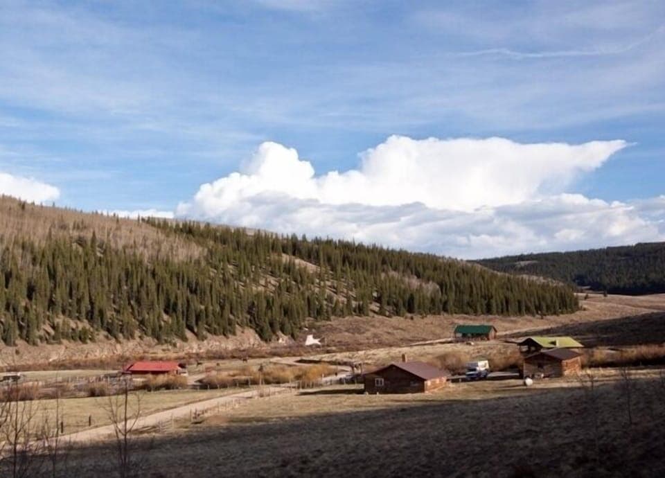 other cabins on the ranch. this cabin is behind this picture in the Aspens