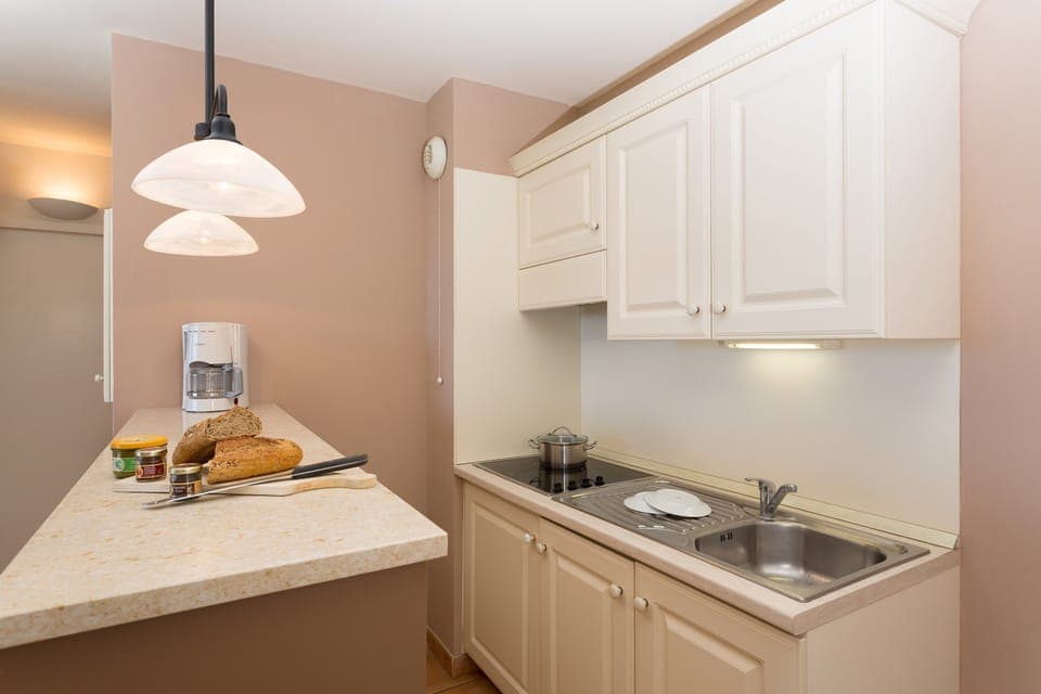 Make a tasty meal in the 2 kitchens in this unit.