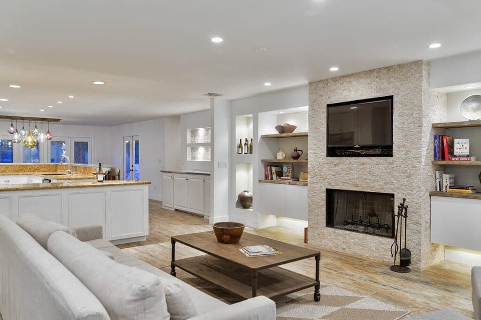 Living room: open, spacious, direct TV, DVD collection, Restoration Hardware.