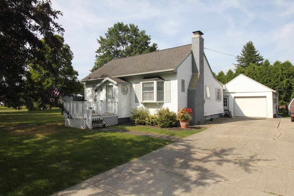 Front of House From Road, 
shared Concrete Driveway, Garage
