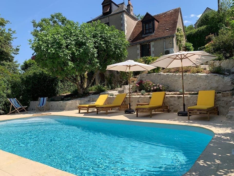 heated salt water pool , sun terrace with view over the Loire River