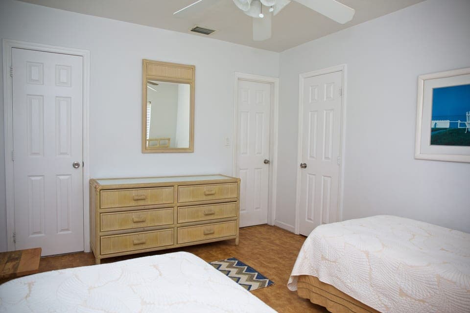 Twin BR -- closet door on right, entry/exit door center, BathR door on left