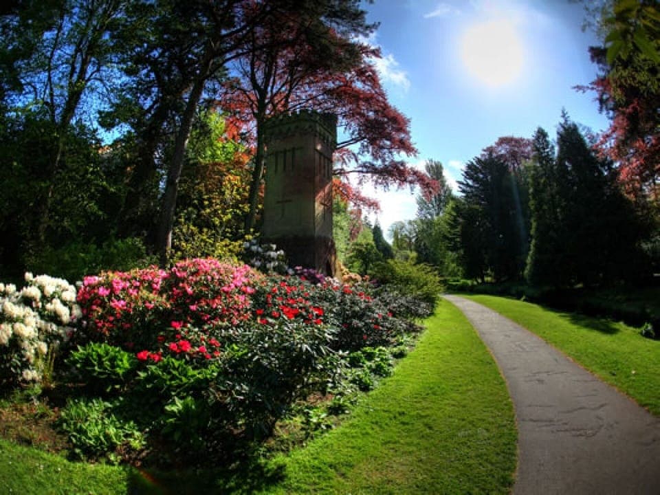 walk through picturesque gardens to town and beach