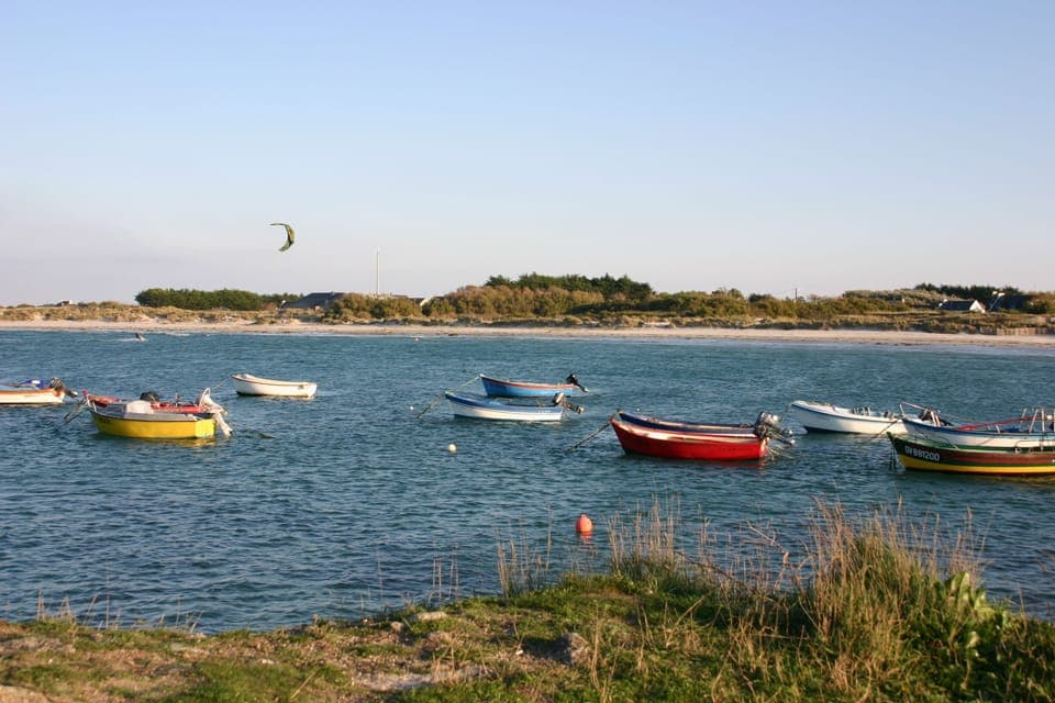 Fishers boats 100m far