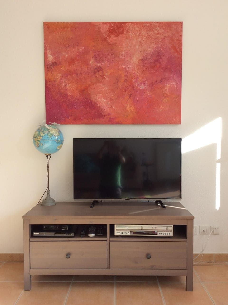 New 40'' TV and aboriginal painting