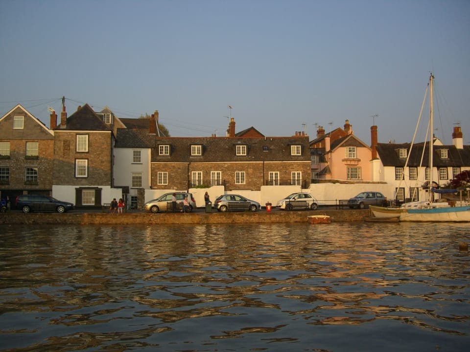 Front of Hannaford's Quay cottage from the estuary at high tide