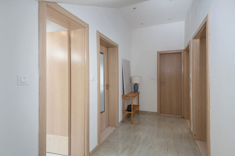 Top floor hall- bedrooms on right, living room-dining room and kitchen on left