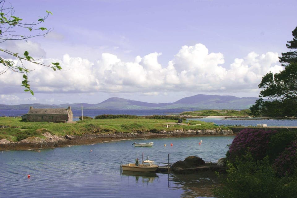 Pier Cottage with beach, Kenmare estuary and mountains beyond 