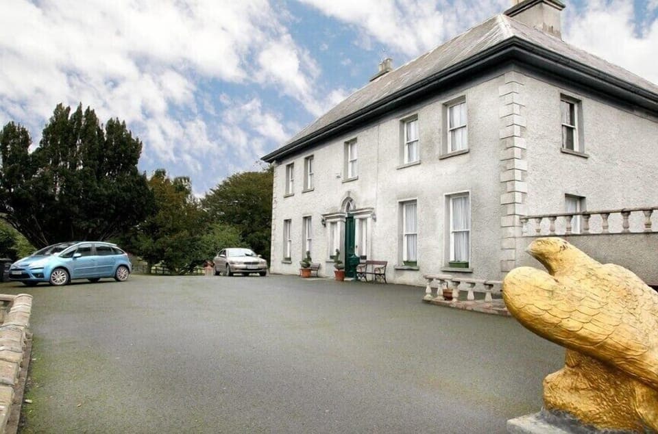 View of house as approached from elegant driveway