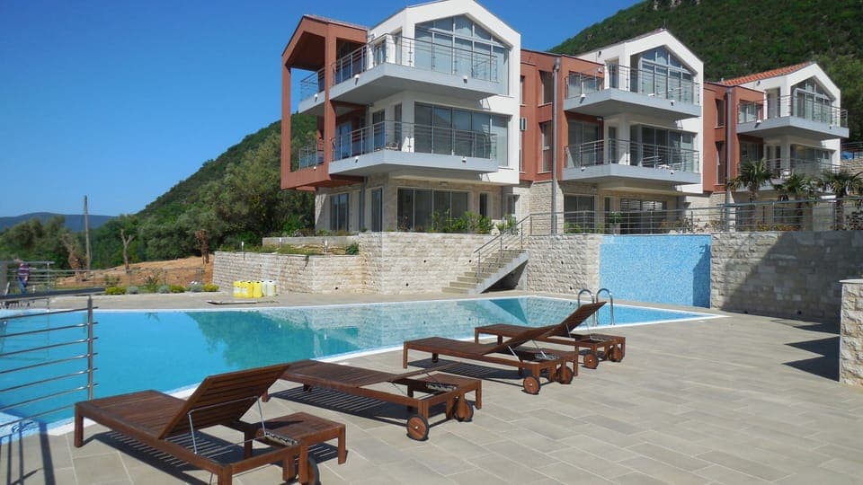 Over the pool, view of the apartment (first building,2nd floor) and the terrace.
