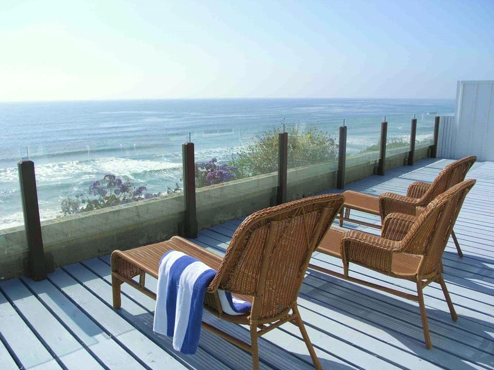 Oceanfront relaxing chaise lounges