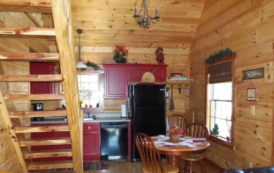 Kitchen 
table can be enlarged to seat 6
