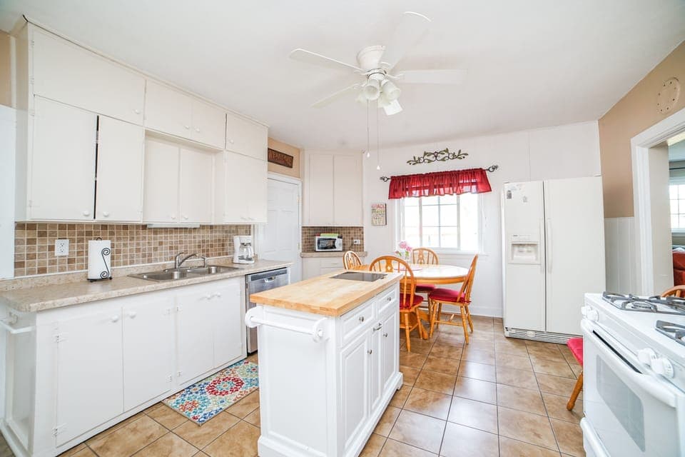 Kitchen with island on wheels