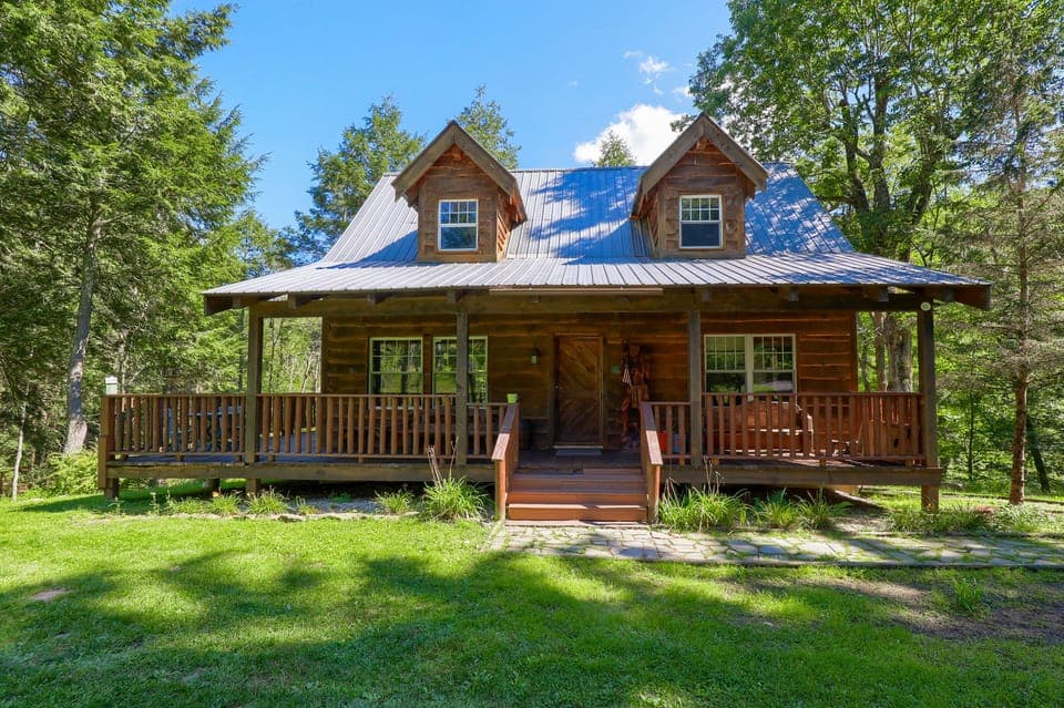 Hand build timber frame cabin made from wood lumbered on site.