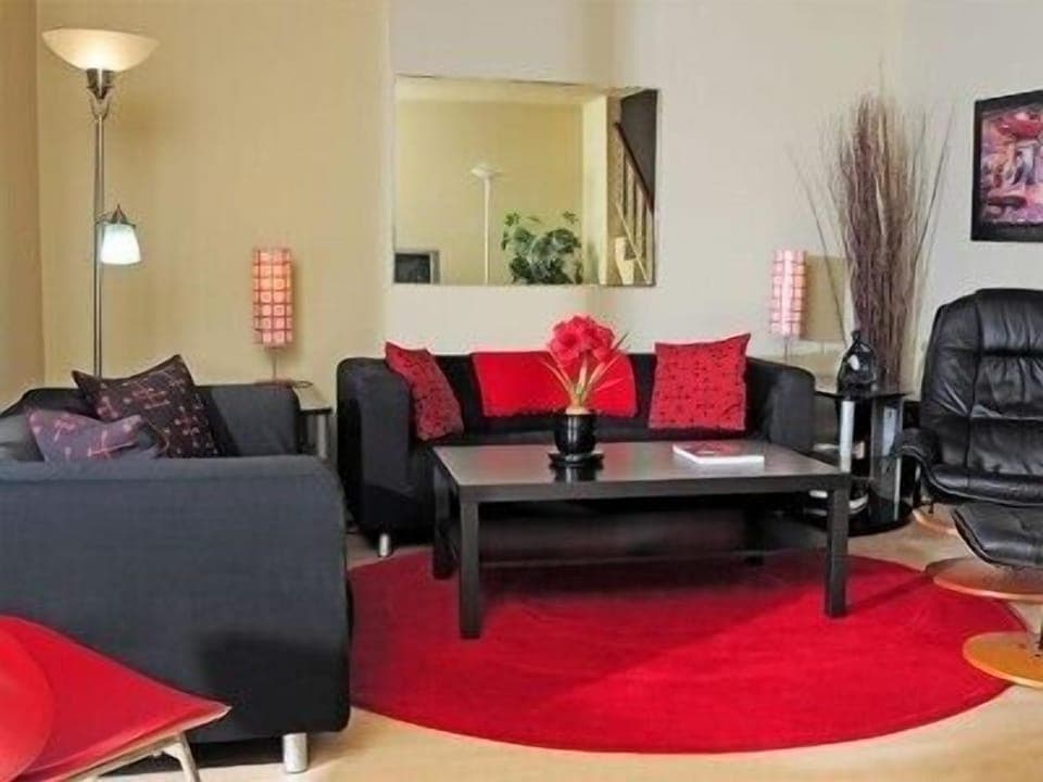 Living Room with poolside pato to left and open to Dining Room to right