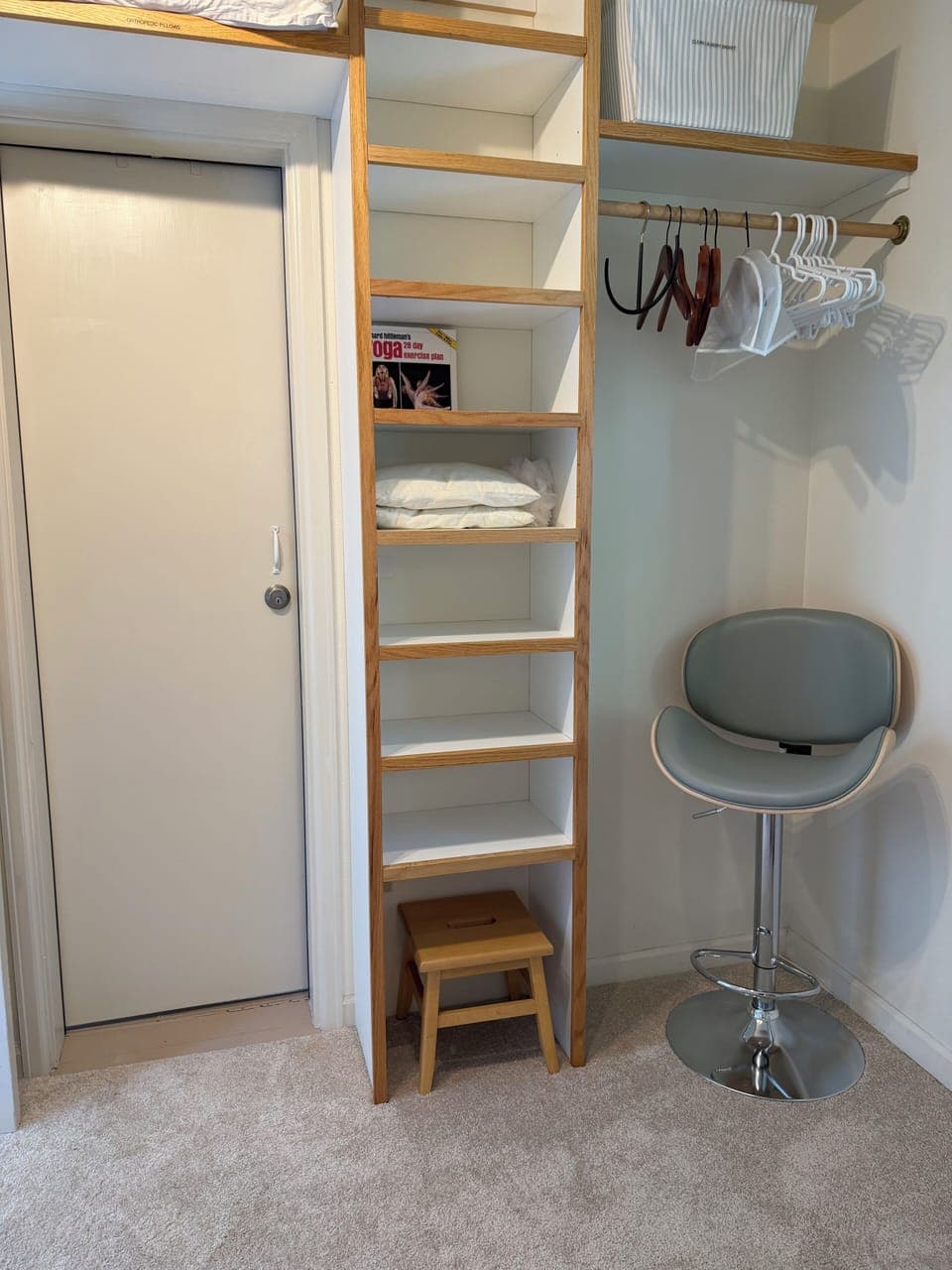 Closet with ample shelves and storage