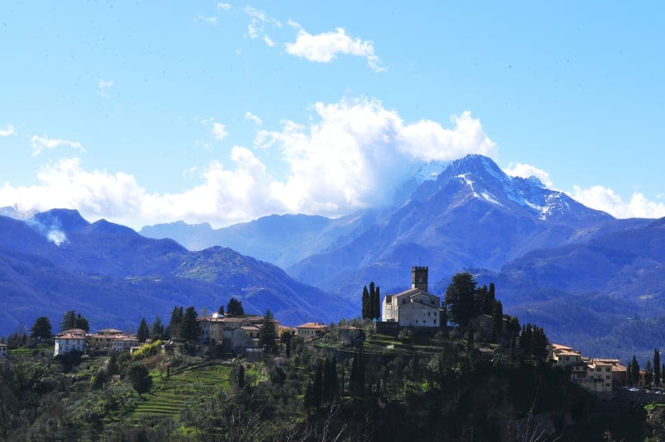 The house is just to the right of the Duomo in the photo here.
