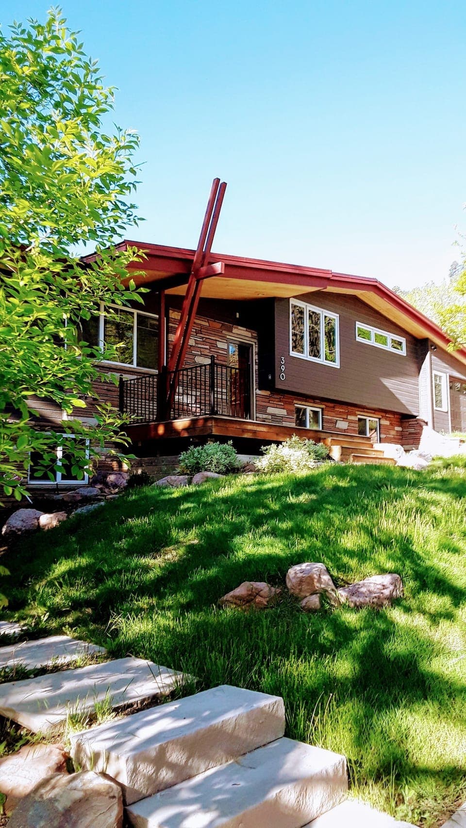 Modern home with natural prairie grass  landscape.  Premier Boulder location.