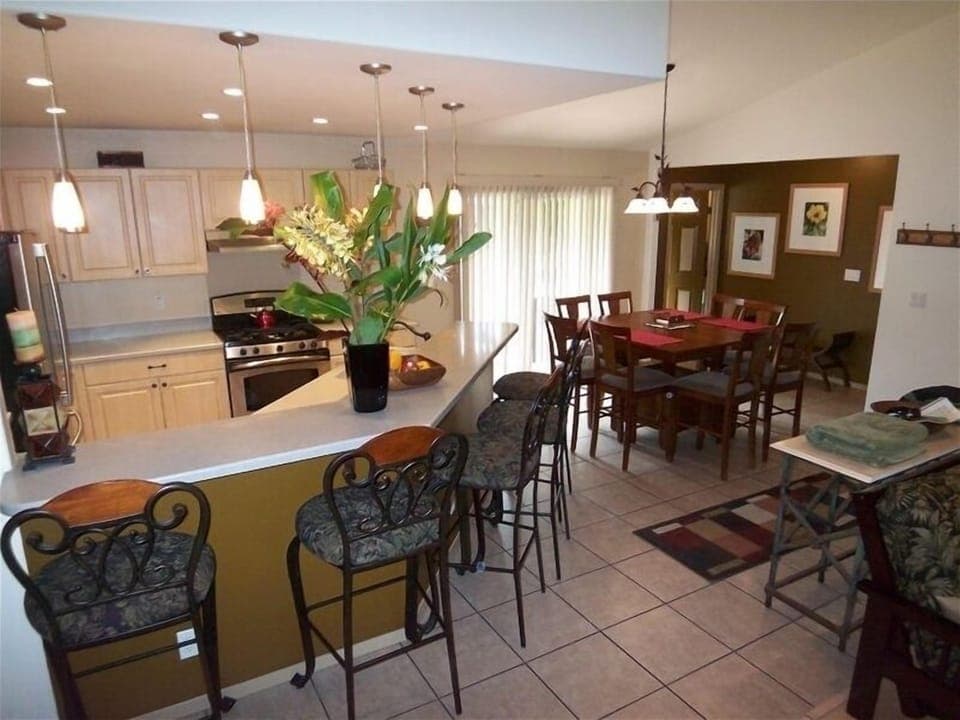 The kitchen peninsula is a great gathering area and seats 5.