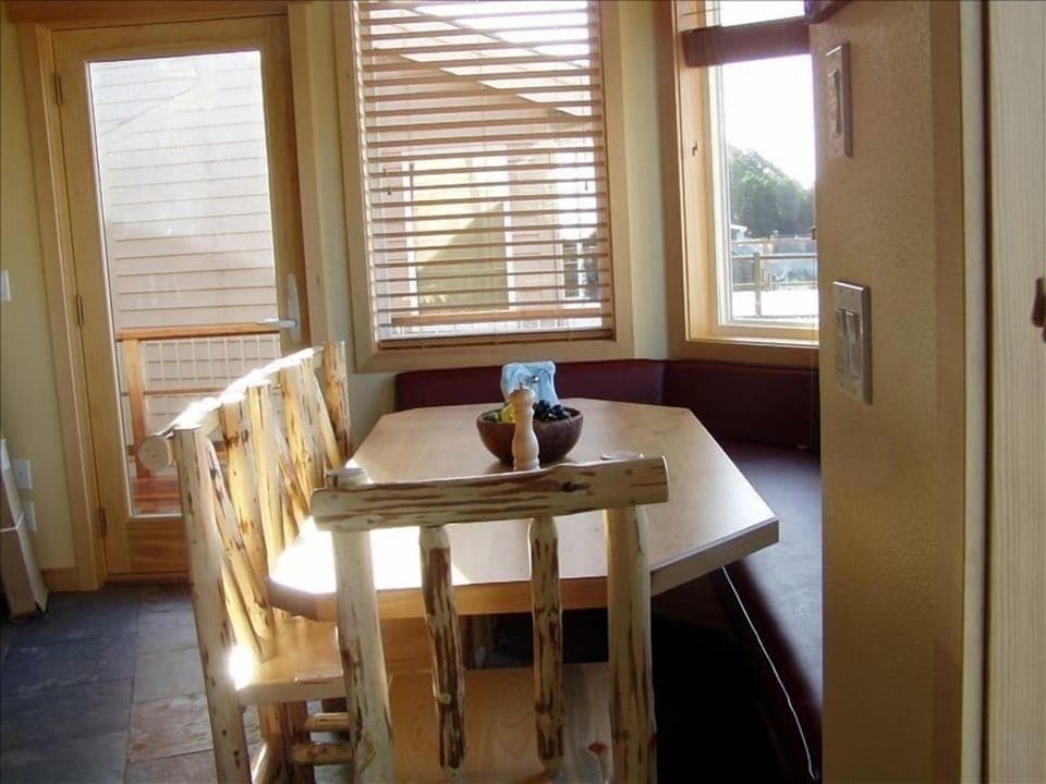 Dining area in kitchen. Seats 8-9.