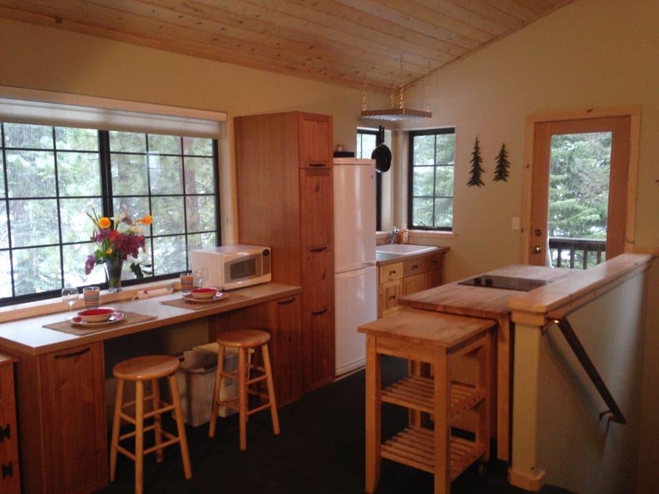 Studio Kitchen and door to balcony