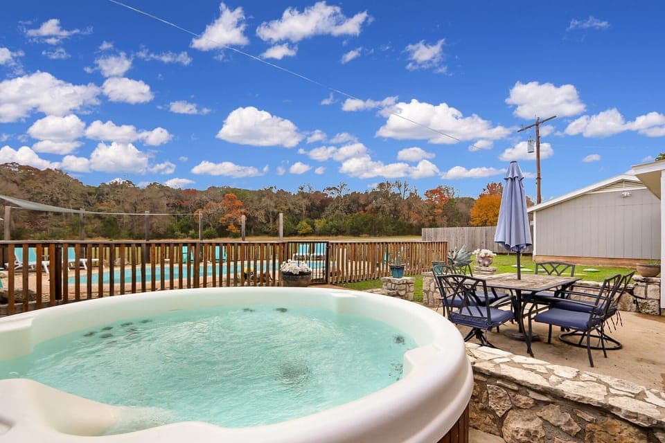 Hot tub next to the pool
