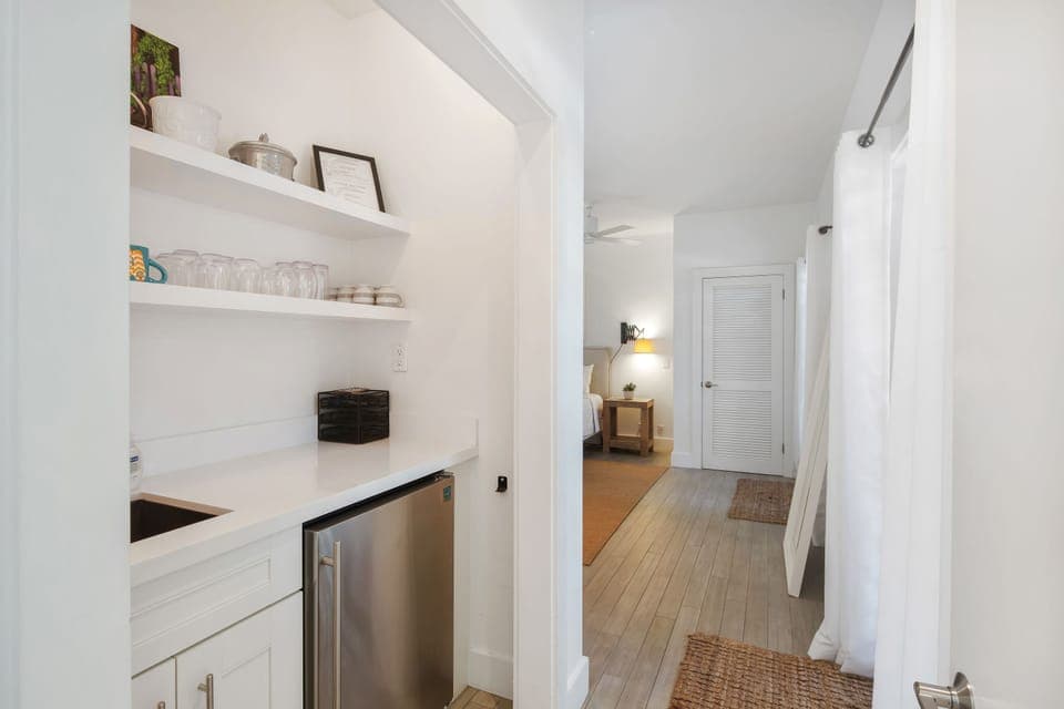 Wet bar and fridge between the king bedrooms for your convenience!