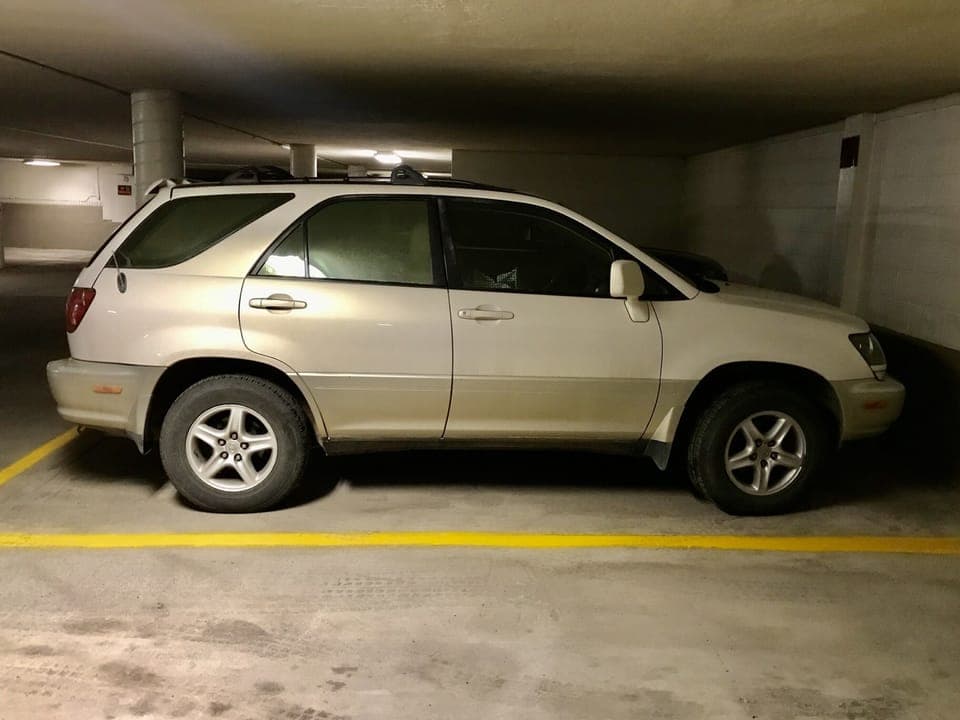 Indoor, heated, secure parking. 
No frosted windshields or snow covered car.