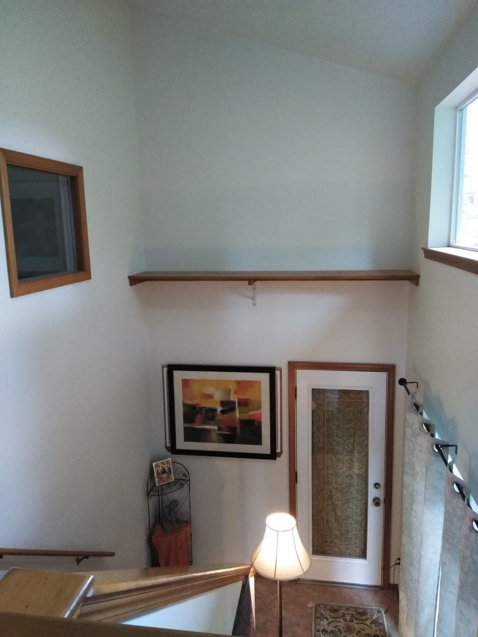 Stairway leading down to main floor bedroom, bathroom and kitchenette