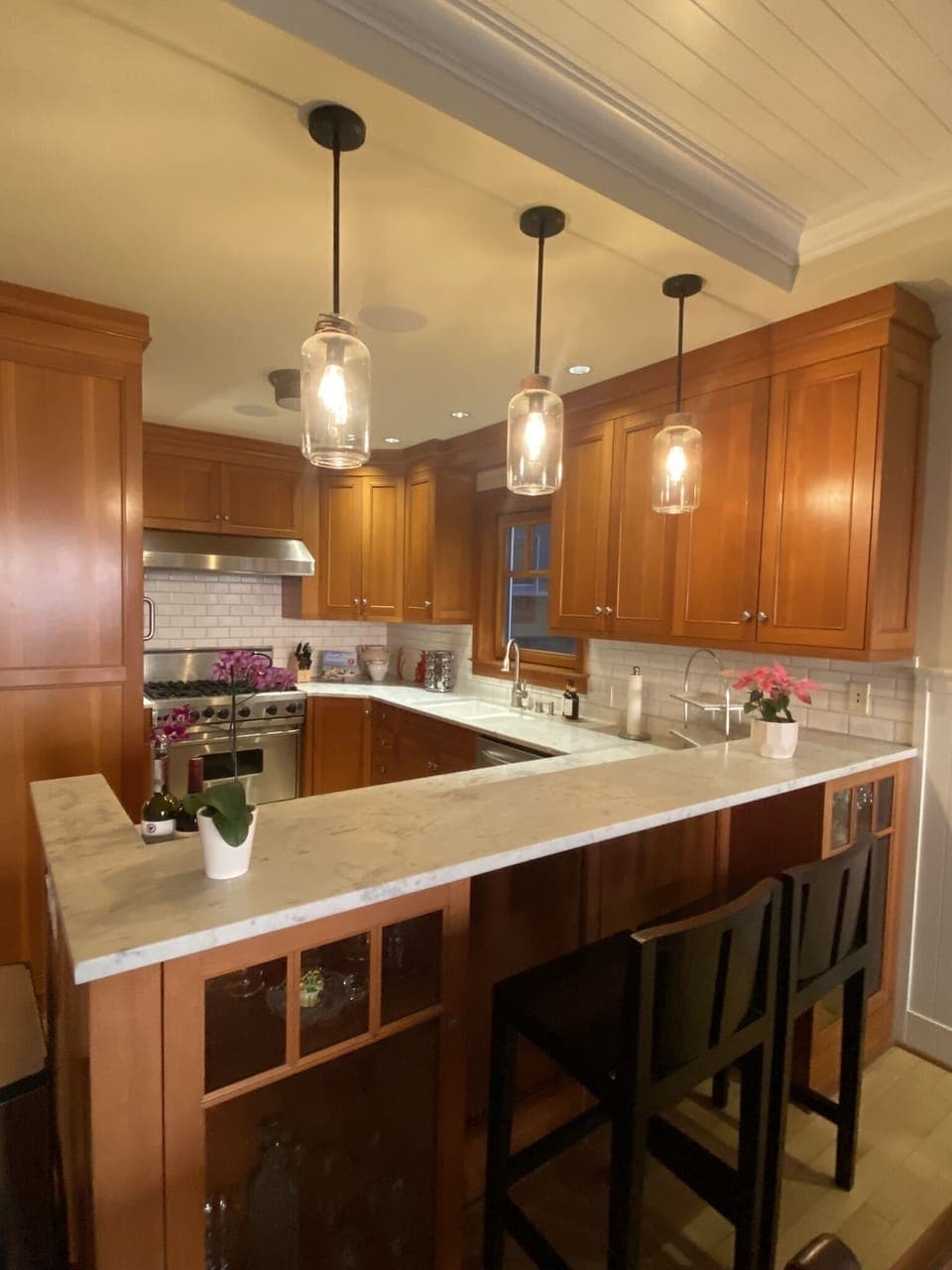 Kitchen features Corsica marble countertops, SubZero refrigerator, Viking stove.