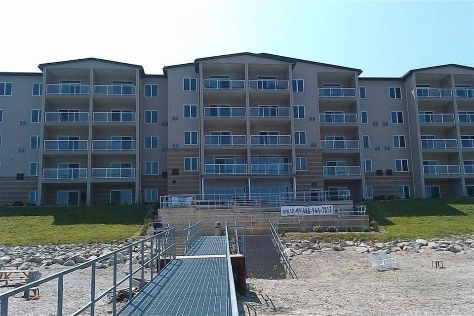 A view back from fishing pier.. Suite #402 is on the TOP floor all the way West.