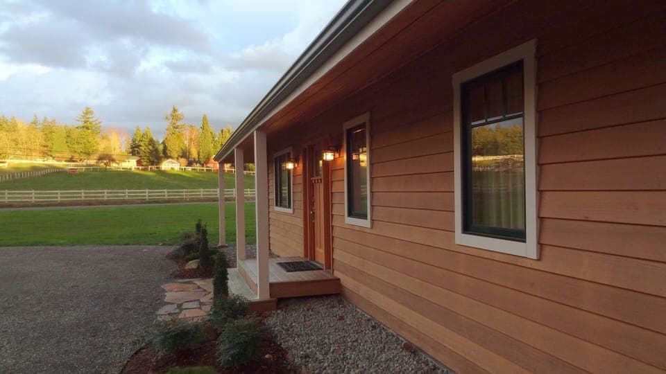 The sun setting across the road.