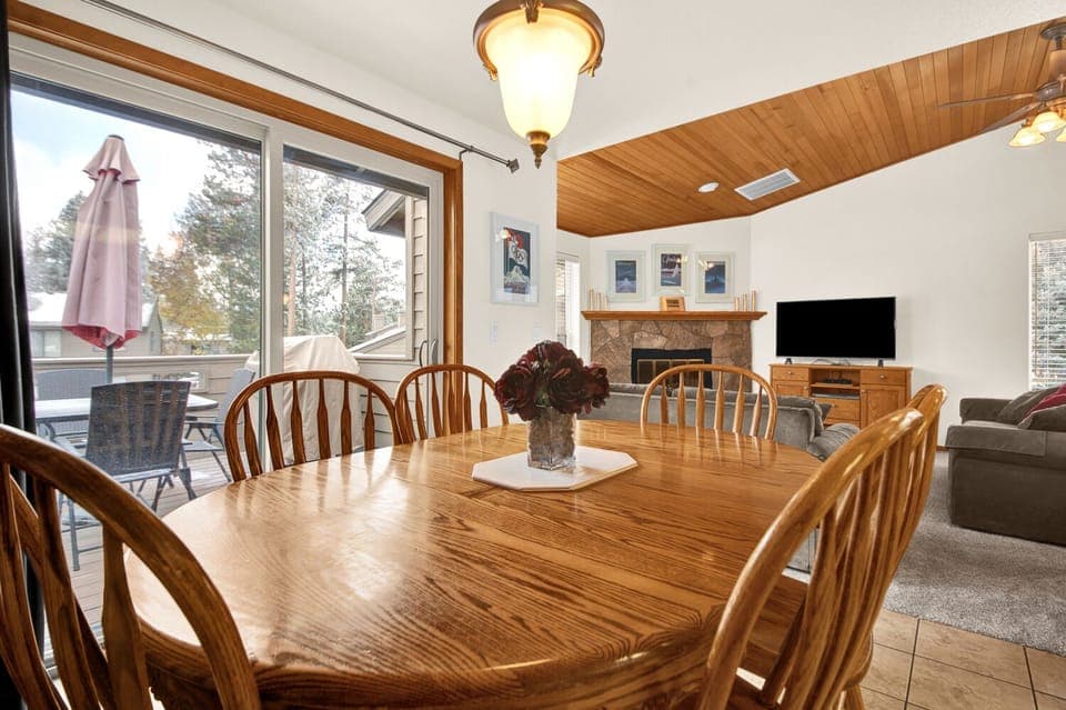 A sliding glass door allows access to the deck