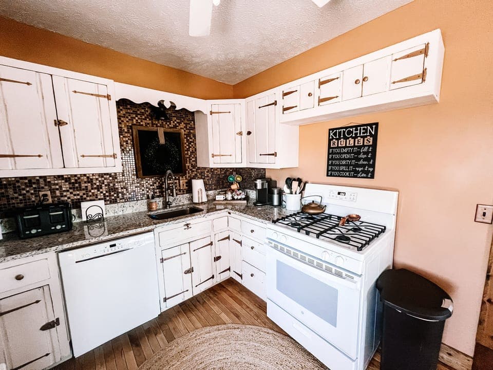 Kitchen with oven, microwave, fridge, toaster, keurig coffee maker & dishwasher