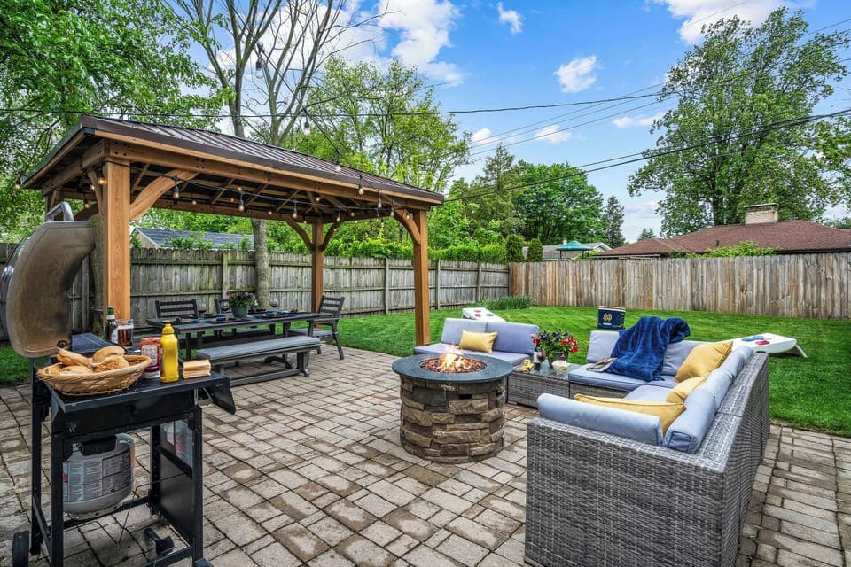 Private, fenced, backyard oasis with Gazebo, Gas Fire Pit and Grill, & much more