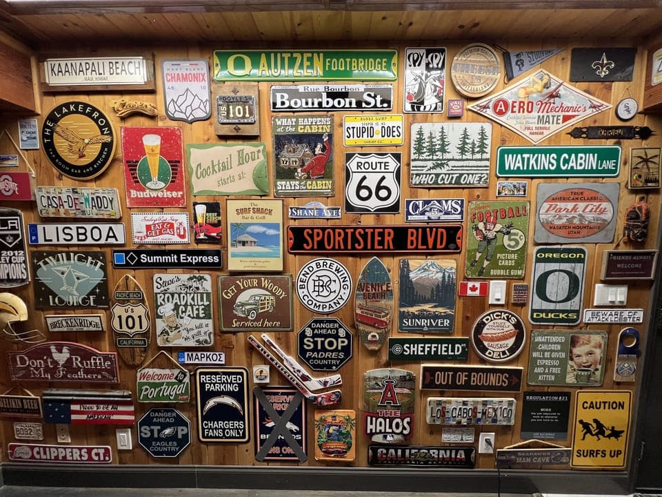 Game room with our collection of signs from around the world. 