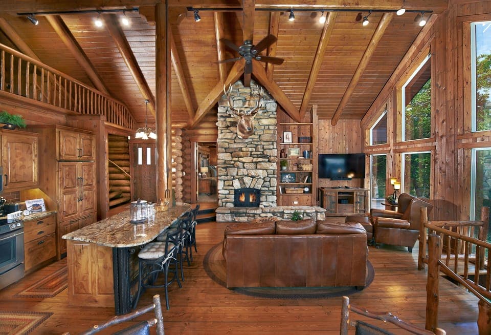 Main Living Room with Kitchen, Sofa Sleeper, and Fireplace