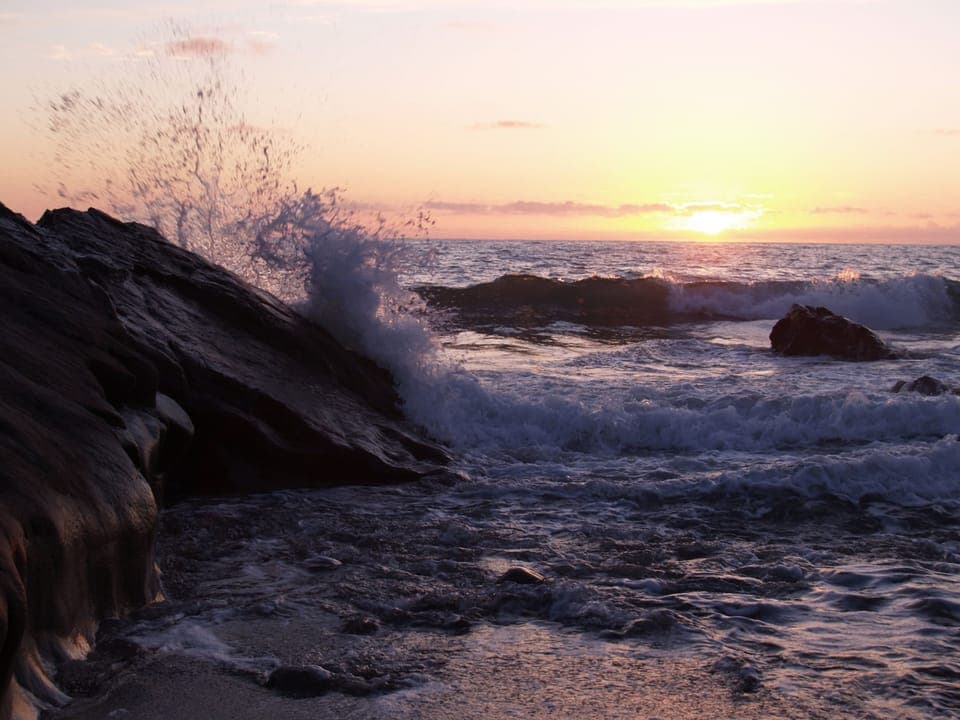 Middle beach wave crash