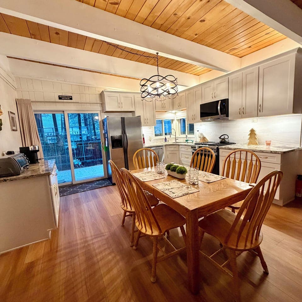 Updated kitchen with new dishwasher, gas stove, microwave, stainless sink 