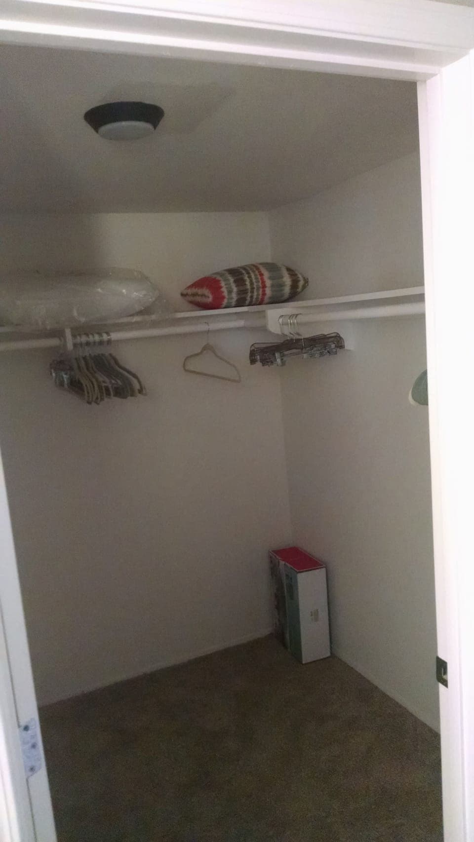 large walk-in closet in master bedroom