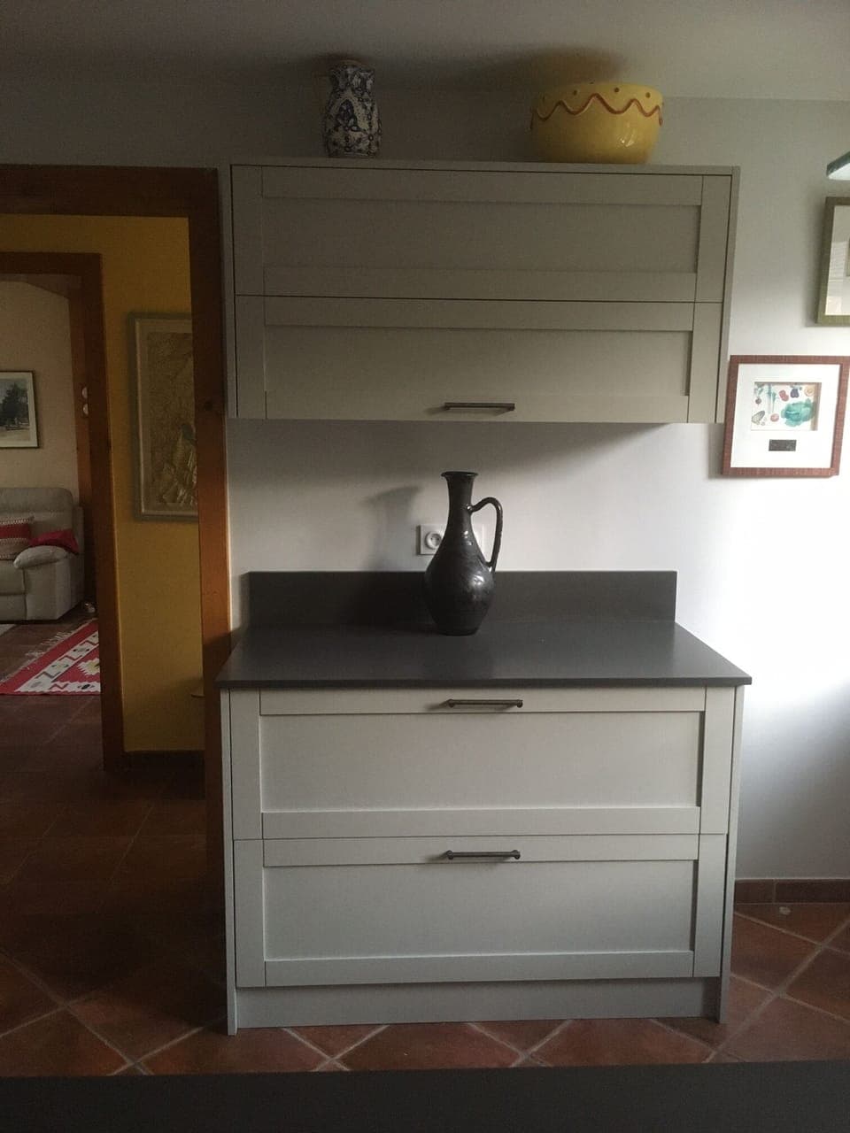 Kitchen, with sitting room in the background